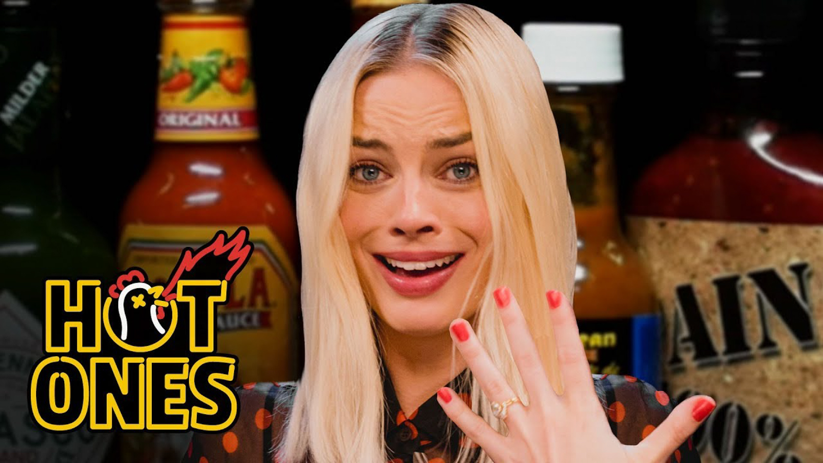 Watch: Margot Robbie Almost Dies In New 'Hot Ones' Episode