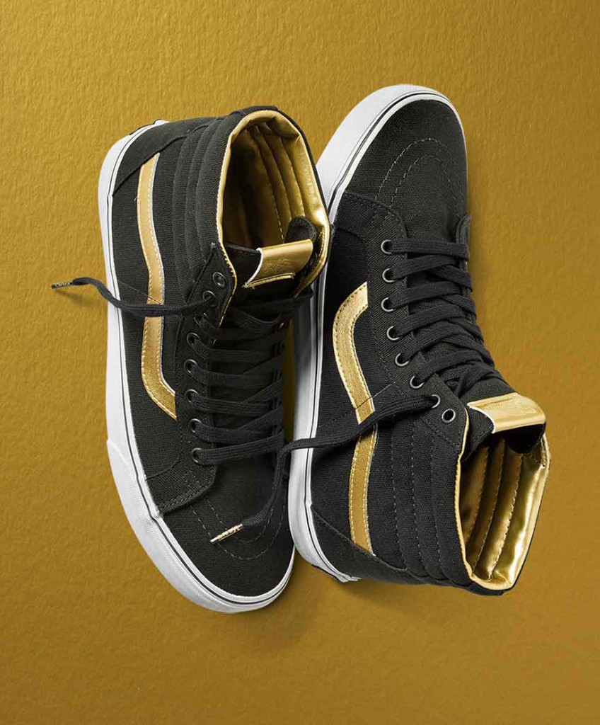 black vans with gold stripe