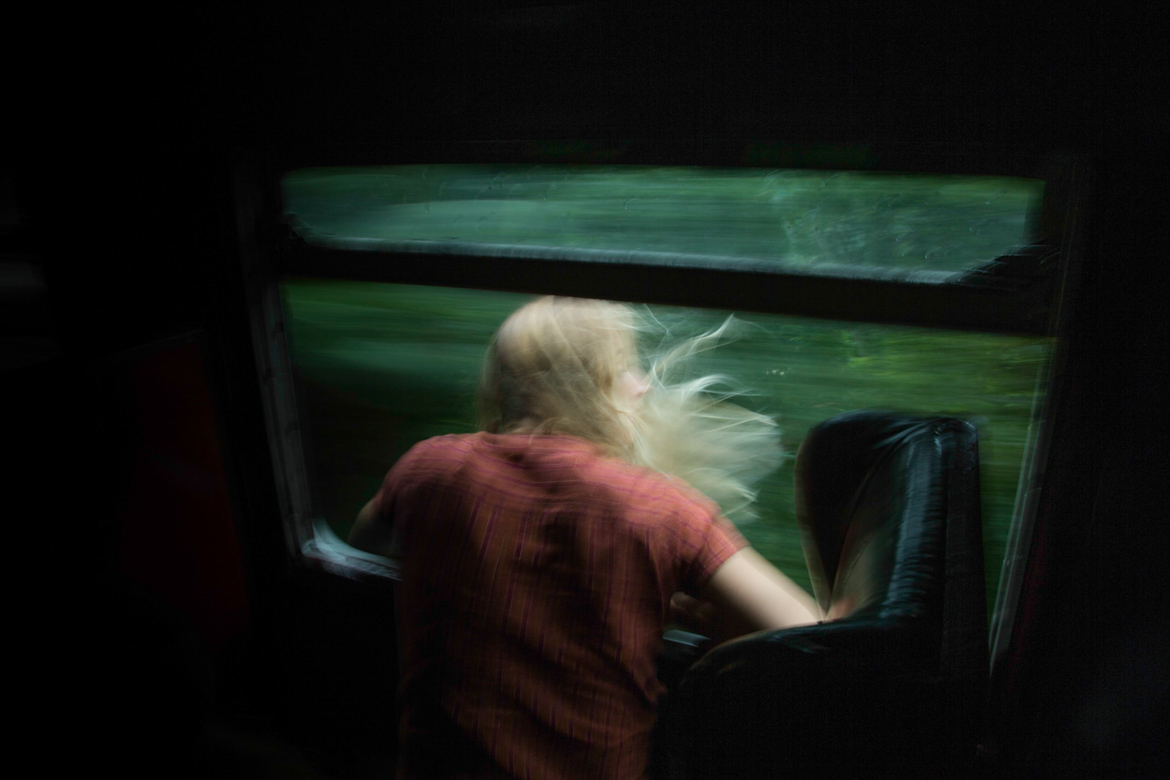 anna-ehrgott-catching-some-fresh-air-on-the-4-hour-long-train-ride-to-kandy-sri-lanka