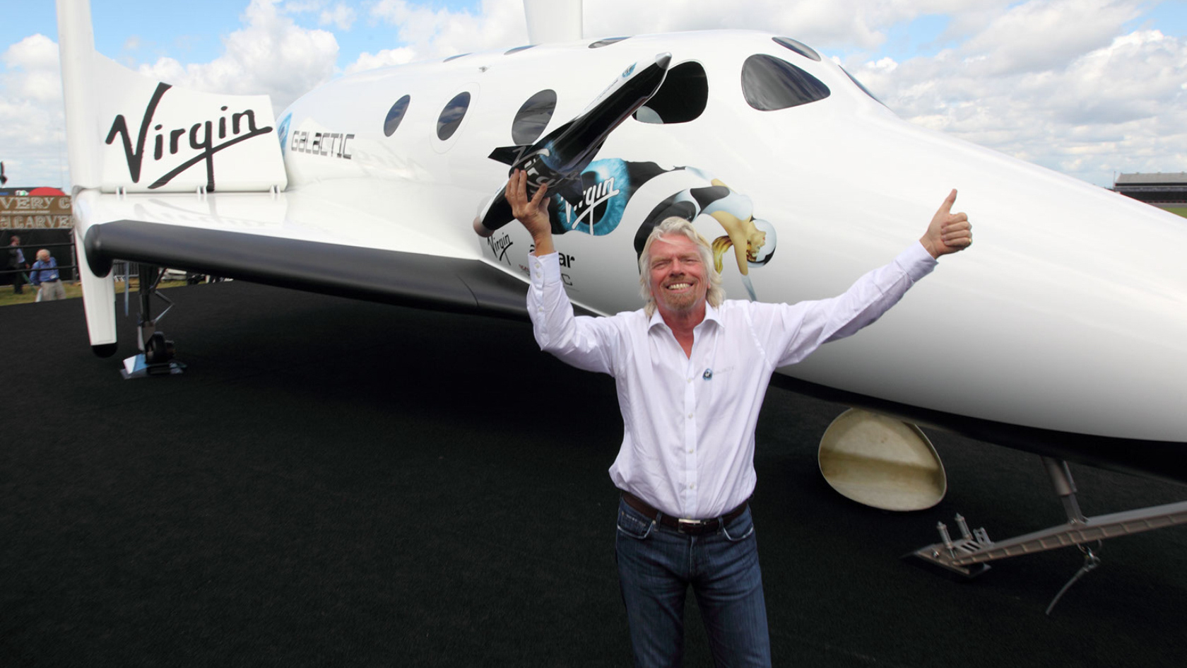 Sir Richard Branson Makes History With First Commercial Flight To Space